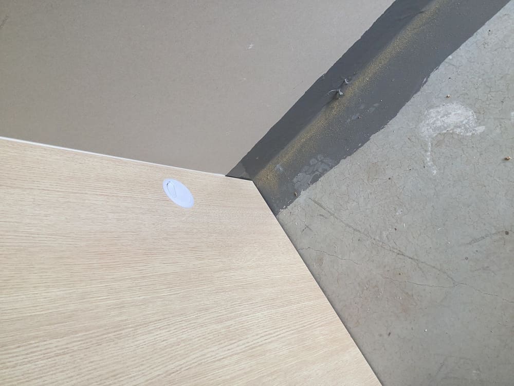 Behind vanity, recorded during a waterproofing inspection in Gleneagle