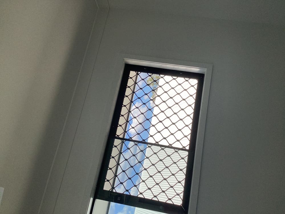 Opening restriction (125mm) required first floor, recorded during a lock-up inspection in Redbank Plains
