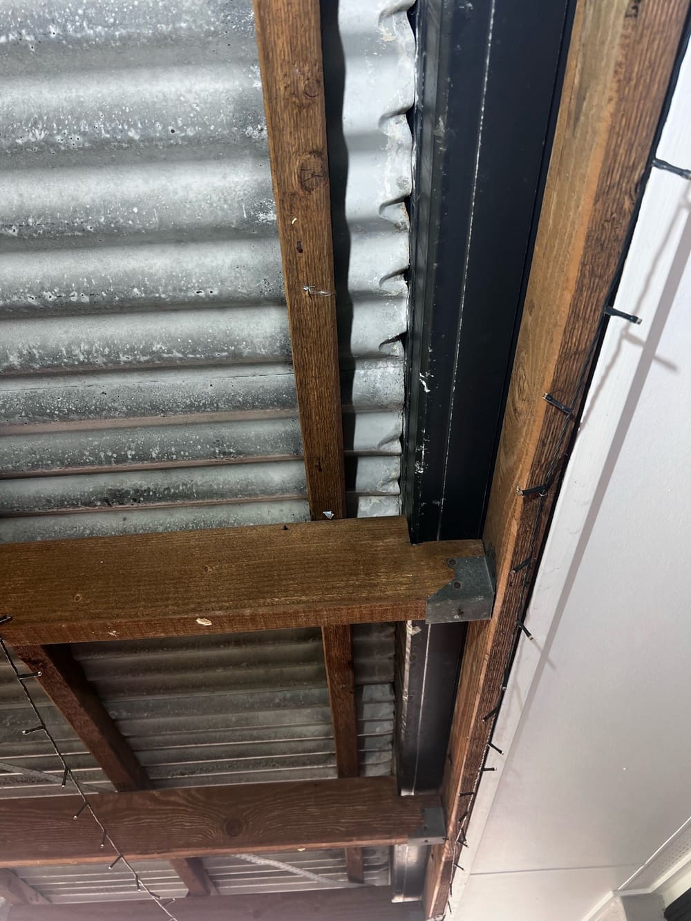 Rust and corrosion to metal roof rear patio, recorded during a pre-purchase inspection in Banyo
